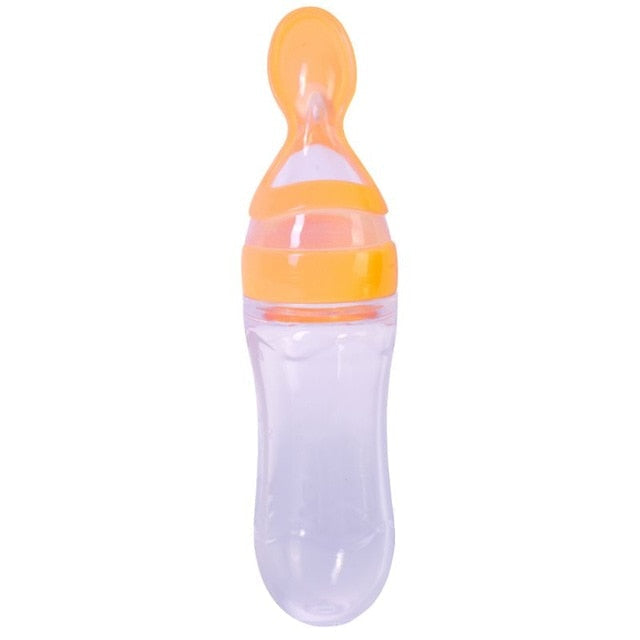 BABY SQUEEZING FEEDING BOTTLE WITH SPOON